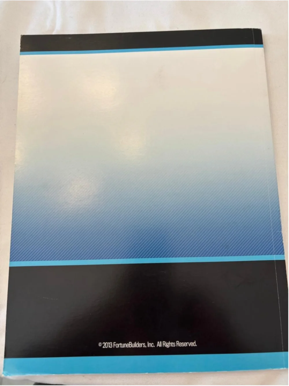 FortuneBuilders Real Estate Book One Size Blue White #E74
